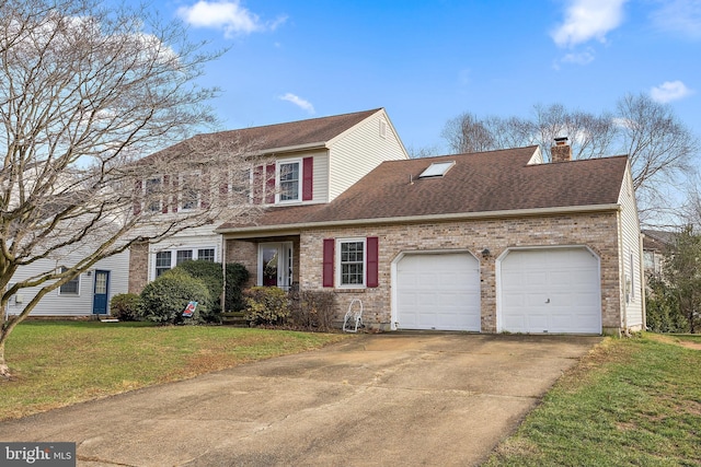 view of front of house featuring a front yard and a garage