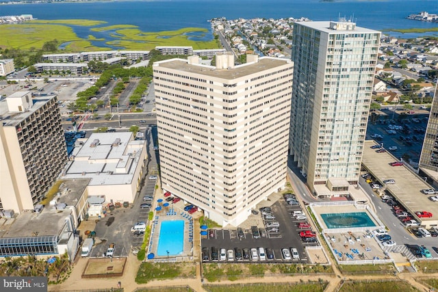 drone / aerial view with a water view