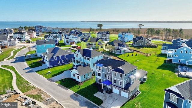 drone / aerial view featuring a water view