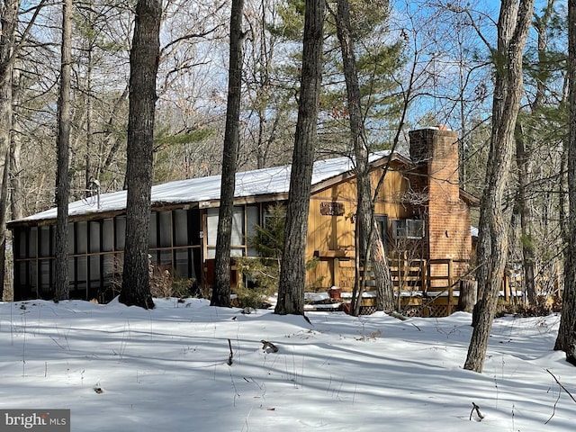 view of snow covered property