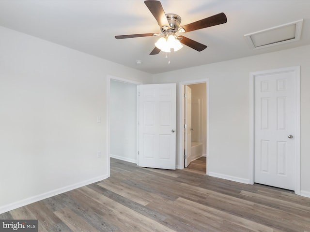 empty room with hardwood / wood-style floors