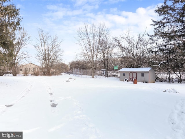 view of yard covered in snow