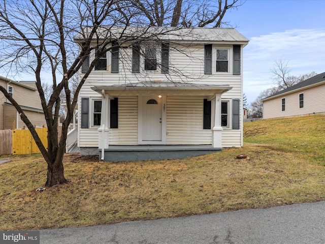 view of front facade with a porch and a front yard