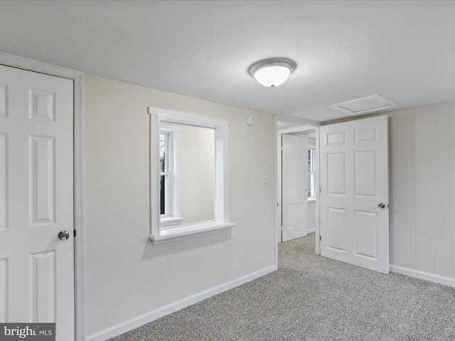 empty room with light colored carpet