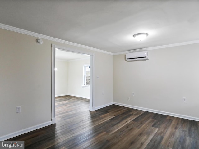 unfurnished room featuring crown molding, dark wood-type flooring, and a wall mounted air conditioner