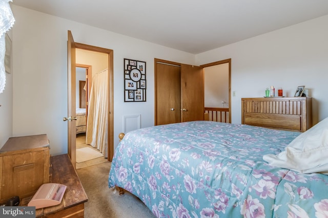 carpeted bedroom featuring a closet