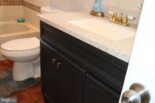 full bathroom featuring tasteful backsplash, vanity, independent shower and bath, and toilet