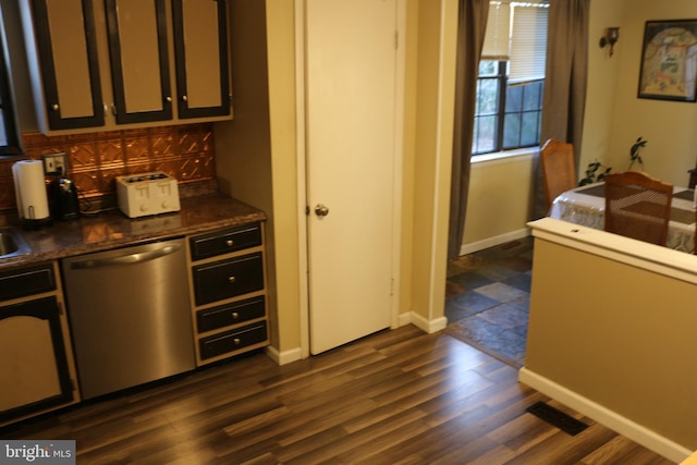 interior space with dishwasher and dark wood-type flooring