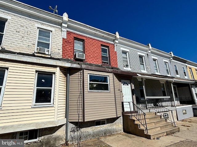 view of property with covered porch