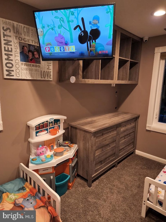 bedroom featuring dark colored carpet