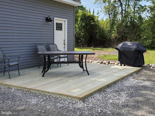 wooden deck with grilling area