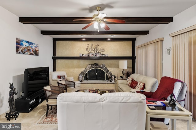 living room featuring beam ceiling and ceiling fan