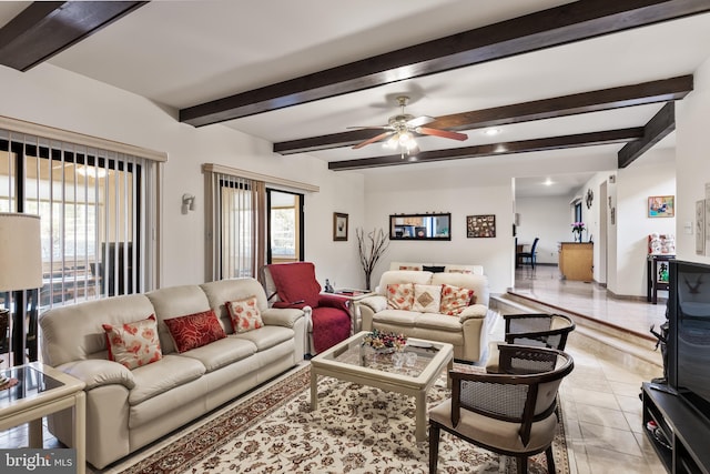 living room featuring ceiling fan and light tile patterned flooring