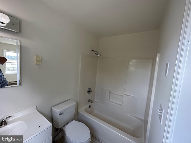 full bathroom featuring vanity, bathing tub / shower combination, and toilet