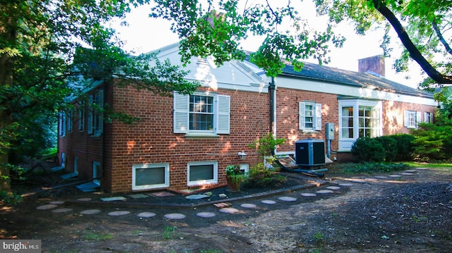 view of front facade with central AC unit