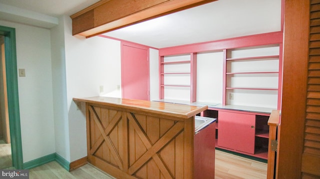 kitchen with light hardwood / wood-style floors