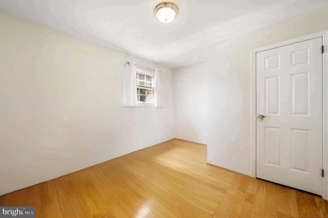 unfurnished room featuring light wood-style flooring