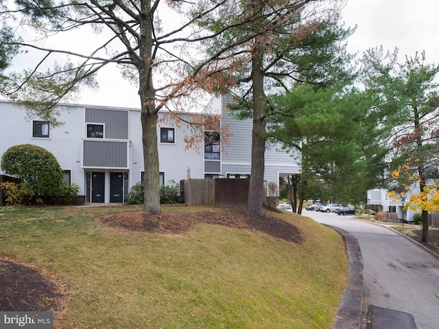 exterior space featuring a front lawn