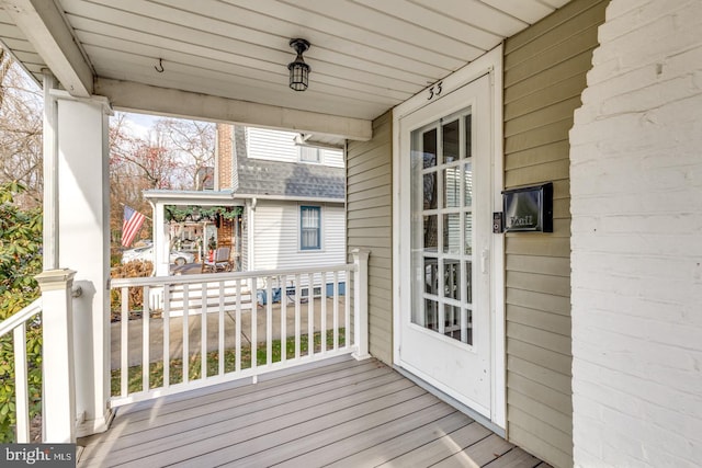 deck with covered porch