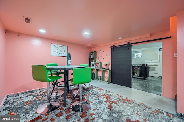 interior space featuring a barn door