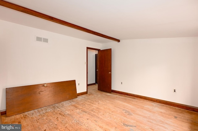 unfurnished room with light hardwood / wood-style floors