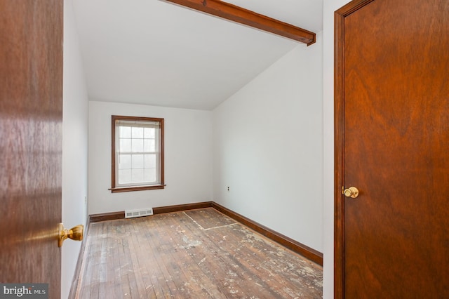 bonus room featuring hardwood / wood-style flooring and vaulted ceiling