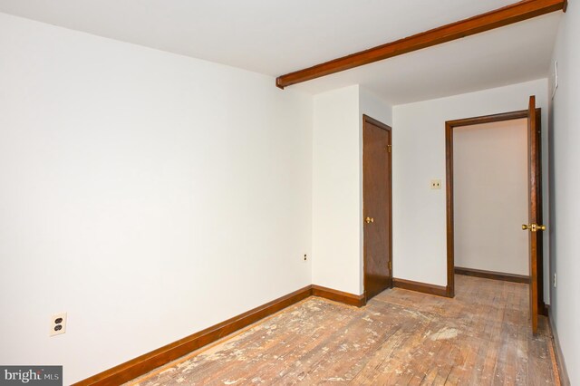 empty room with light wood-type flooring