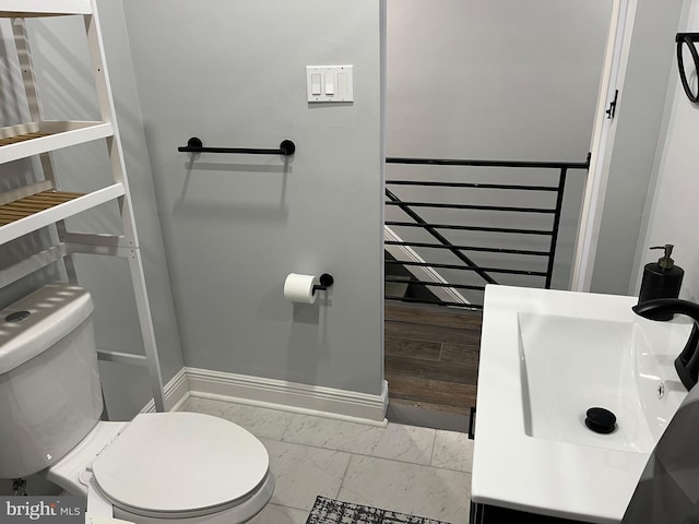 bathroom with toilet and sink