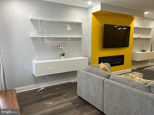 living room with dark hardwood / wood-style floors