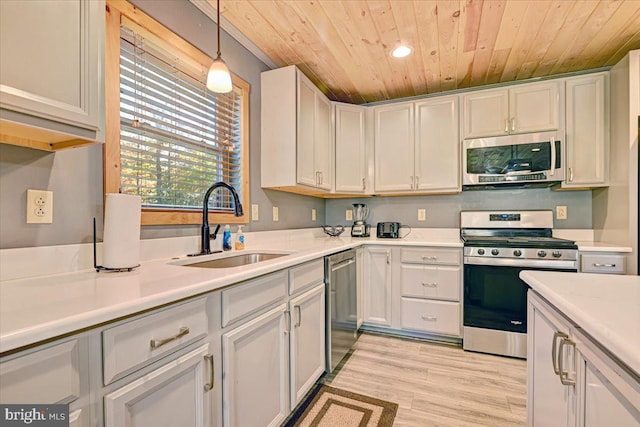 kitchen featuring sink, wooden ceiling, stainless steel appliances, decorative light fixtures, and light wood-type flooring