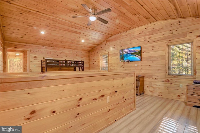 unfurnished bedroom featuring wooden walls, wood ceiling, lofted ceiling, and hardwood / wood-style flooring