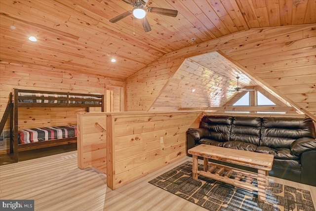 interior space featuring wood-type flooring, wood walls, and wood ceiling