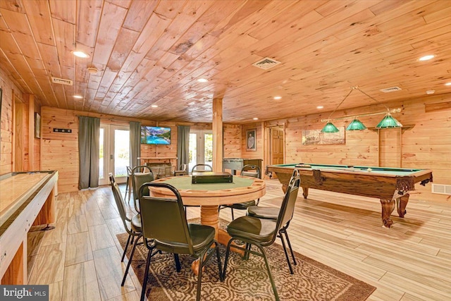 playroom with wood walls, light wood-type flooring, wood ceiling, and pool table