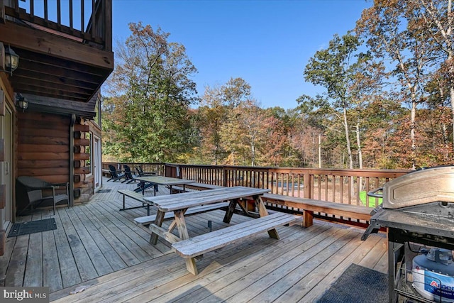 wooden terrace with grilling area