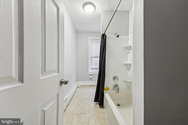 bathroom with tile patterned flooring, shower / bathtub combination with curtain, and baseboard heating