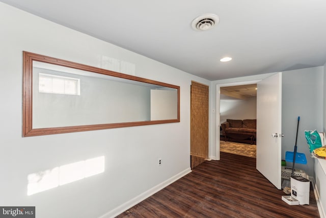 hall featuring dark hardwood / wood-style floors