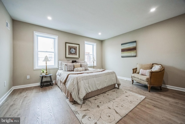 bedroom featuring hardwood / wood-style floors