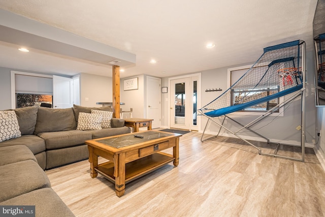 living room with light hardwood / wood-style floors