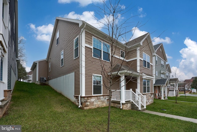 view of front of property with a front lawn