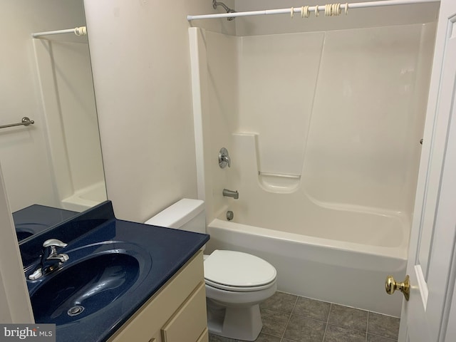 full bathroom with tile patterned flooring, vanity, toilet, and washtub / shower combination