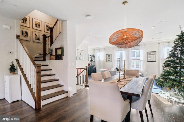 dining room with dark wood-type flooring