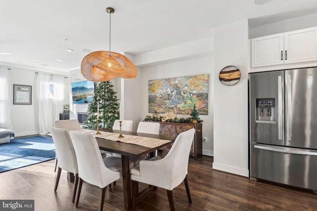 dining room featuring dark hardwood / wood-style flooring