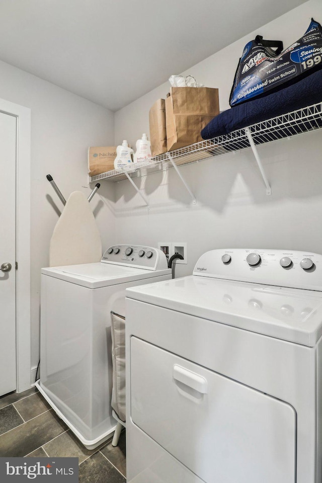 laundry area featuring washer and clothes dryer