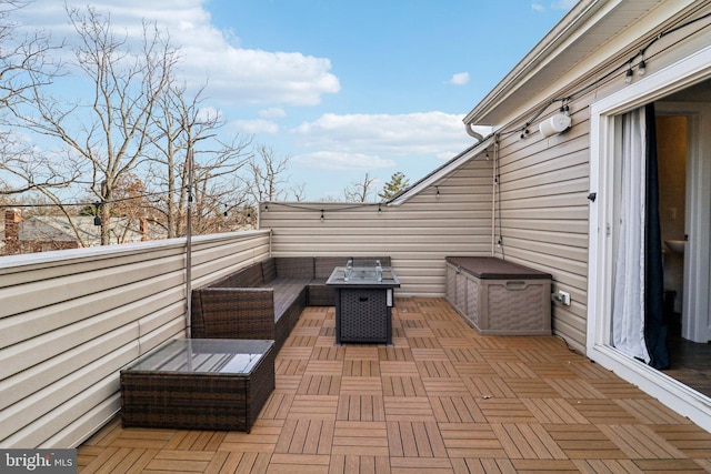 view of patio / terrace with an outdoor living space and a balcony