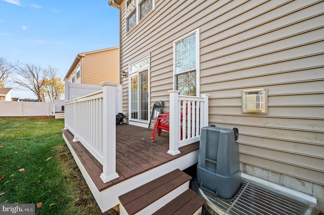 deck featuring a lawn