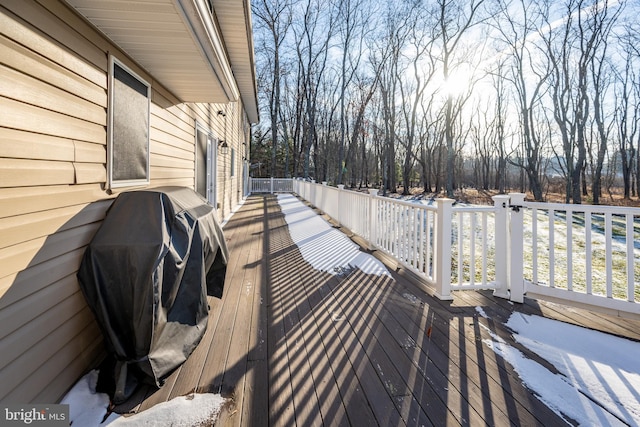 wooden terrace with area for grilling