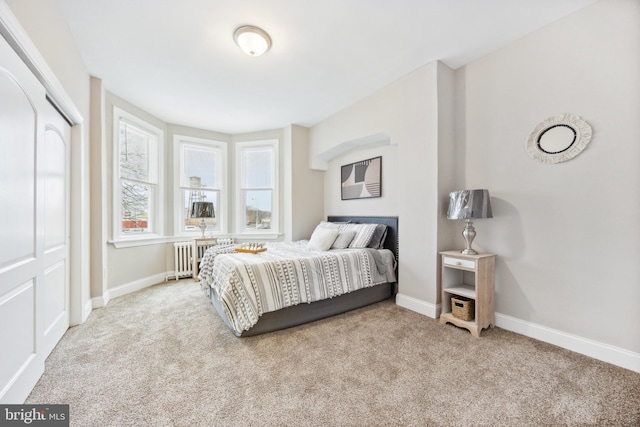 bedroom with light carpet