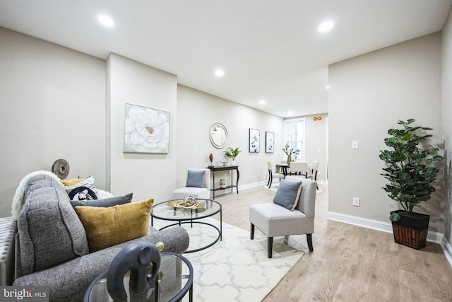 living room with light hardwood / wood-style floors