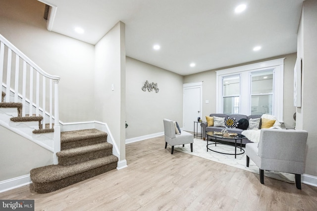 living room with light hardwood / wood-style floors