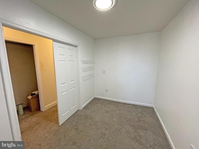 unfurnished bedroom featuring carpet